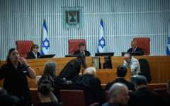 High Court President Isaac Amit arrives for a  court hearing on petitions against the appointment of retired judge Yosef Ben-Hamo to lead the probe into the Sde Teiman abuse leak, at the High Court of Justice in Jerusalem, November 27, 2025. (Yonatan Sindel/Flash90)