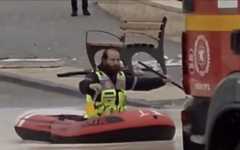 A United Hatzalah volunteer rescues stranded travelers from a flooded road in Beit Shemesh, November 25, 2025. (Screenshot/United Hatzalah)