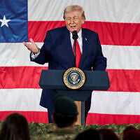 US President Donald Trump delivers remarks to troops at Fort Bragg, North Carolina, February 13, 2026. (AP Photo/Matt Ramey)