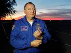 Director General of the Russia state corporation Roscosmos Dmitry Rogozin walks in Baikonur airport, in Kazakhstan