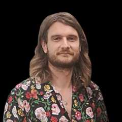 Headshot of Kevin E G Perry