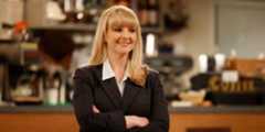 Judge Abby Stone smiles in Night Court.