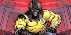 An ape soldier sits in the captain's chair wearing a starfleet uniform 