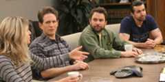 Dee, Dennis, Charlie, and Mac sat together arguing in the arbitrator's office