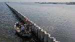 A sea wall along the coastal area of Cilincing, North Jakarta, September 12, 2025.  Indonesia's Ministry of Marine Affairs and Fisheries confirmed that the reclamation project by PT Karya Citra Nusantara (KCN) in the area has obtained all necessary permits. Tempo/Tony Hartawan.