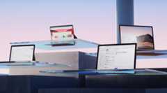 Image shows laptops on the glass shelves.