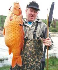 Bow hunter and koi carp