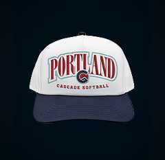 White cap with red and light blue Portland Cascade logo and navy brim