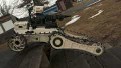 Staff Sgt. John Tourtellotte, the 104th Civil Engineering Squadron explosive ordnance disposal equipment NCO in charge, operates a Roboteam Micro Tactical Ground Robot Feb. 16, 2018, at 104th Fighter Wing in Westfield, Mass. The MTGR can be carried in a backpack and is a safer way for Airmen to examine possible threats.