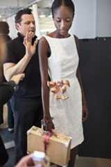 Behind the scenes, preparing the spring 2010 collection; Mizrahi’s design process is intense and at times hilarious, with many rounds of fittings and much impromptu experimentation. Photograph © Jason Frank Rothenberg.