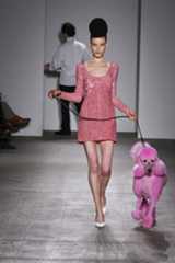 A pink dress and matching pink poodle on the runway from the Cake collection, fall 2011. Mizrahi’s sense of humor and theater persists. Photograph by Dan Lecca.