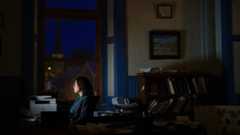 Maeghan Maloney working at her desk.