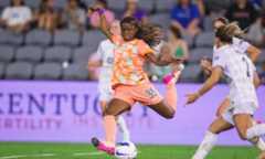 Image of Simone Jackson taking a shot against Racing Louisville.