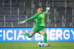 Image of Cosette Morche taking a goal kick against Pachuca.