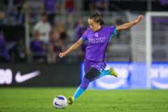 Image of Luana playing a ball in the midfield against Seattle in the 2025 NWSL playoffs.