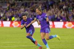 Image of Carson Pickett and Marta celebrating Orlando's goal in a 1-1 home draw vs. Seattle.