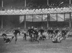 Cornell quarterback Charley Barrett carrying the ball