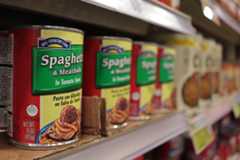 Cans sit on a shelf, Friday, April 16, 2021, at HEB on East Hopkins Street.