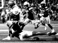 Eastern Michigan graduate running back Dontae McMillian (28) breaks a tackle attempt from Texas State junior cornerback Khamari Terrell (4), Saturday, Aug. 30, 2025, at UFCU Stadium. The Bobcats would won 52-27.