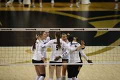 The Texas State volleyball team huddles together following a point against Tulsa, Friday, Sept. 12, 2025, at Strahan Arena. Texas State lost 3-0.