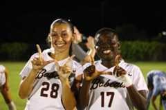 Junior midfielder Annabelle Fisher (28) and junior forward Constance Agyemang (17) pose with the "W" hand sign following a match against Southern Miss. Saturday, Oct. 18, at Bobcat Soccer Complex. TXST won 6-1. 