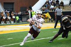 Texas State freshman quarterback Brad Jackson (8) scrambles in the pocket, Saturday, Nov. 15, 2025, at M.M. Roberts Stadium. The Bobcats beat Southern Miss 41-14, ending their 5-game losing streak.
