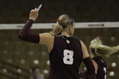 Texas State junior hitter Samantha Wunsch (8) celebrates after a kill against Coastal Carolina, Friday, Nov. 7, 2025, at Strahan Arena. The Bobcats sweep the Chanticleers 3-0.