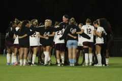 Texas State soccer associate head coach Nathan Stockie (center) rallies his squad in preparation for the second half against Baylor during the NCAA Tournament, Friday, Nov. 14, 2025 at Betty Lou Mays Field in Waco, Texas. Baylor defeated Texas State 3-0.