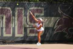 Texas State sophomore Charlotte Roeschis serves the ball at the River State Shoot Out, Sunday, Oct. 5, 2025, at Bobcat Tennis Complex.