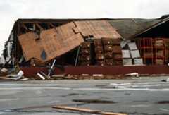 Hurricane_Gilbert_-_Damaged_warehouse.JPEG
