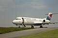 "Fokker 70" d'"Air France - Air Inter" sur le parking de l'aéroport de Quimper-Cornouaille (1996)