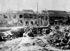 Chinese troops in the 87th and 88th Divisions at the north station, just before they were withdrawn to Sihang Warehouse. Note their German-made M1935 helmets.