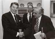 President Ronald Reagan awarding Teller the National Medal of Science and shaking his hand in 1983 at the White House.