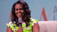 Michelle Obama says her memoir shares the 'ordinariness of a very extraordinary story'
