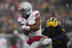 No. 1 Ohio State beats No. 15 Michigan, sets up game with No. 2 Indiana for Big Ten title