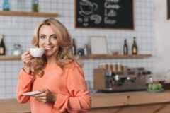 Lady in a Cafe in Spain living here on a non-lucrative visa