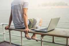 A remote worker with his laptop living in Europe on a freelancer visa