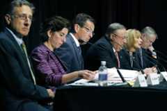 Seated from left are Vermont Gov. Peter Shumlin, Rhode Island Gov. Gina Raimondo, Connecticut Gov. Dannel P. Malloy, Maine Gov. Paul LePage, Hassan, and Massachusetts Gov. Charlie Baker. The governors met Tuesday in Boston to discuss strategies to deal with the opioid addiction problem in all their states. (Michael Dwyer/AP)