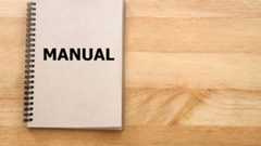 User manual or Instruction manual book on wooden desk