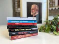 Stack of books authored by former WPF Director Robert Rotberg.