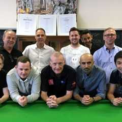 Photo of Steve Davis with coaches