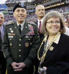 Gen. David Petraeus, commander U.S. Central Command, left stands with his wife Holly before the NFL Super Bowl XLIII football game between the Arizona Cardinals and the Pittsburgh Steelers, Sunday, Feb. 1, 2009, in Tampa, Fla. (AP Photo/David J. Phillip)
