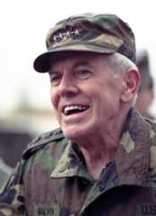 NATO Commander John R. Galvin holds a press conference in Boeblingen, Germany in 1990. General Galvin was a significant friend and mentor to the young David Petraeus. (AP Photo/Thomas Kienzle)