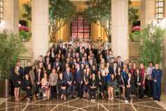 Academy Chairman and CEO Wayne R. Reynolds, Summit Host Chairman Catherine B. Reynolds, Summit Co-Host John Overdeck, and the 2019 delegates at the Four Seasons Hotel in New York City prior to the opening reception and dinner during the 53rd International Achievement Summit.