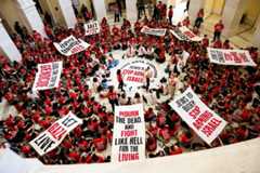 Demonstrators from Jewish Voice for Peace protest the war in Gaza at the Canon House Building on July 23, 2024 in Washington, DC