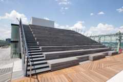 empty bleachers on a rooftop park space