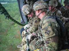 image of rangers flying in helicopter