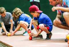 Campers stacking apples for the camp olympics
