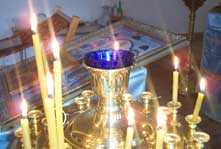 Candles in a gold and blue holder