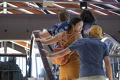 Customers on an escalator